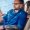 stylish-bearded-male-eyeglasses-with-tattoo-his-arm-talking-by-smart-phone-car2